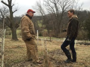 Discussing a shrub and tree planting for wildlife habitat, snow catchment, and wind protection with a Prudenterra client, on their central Iowa acreage.